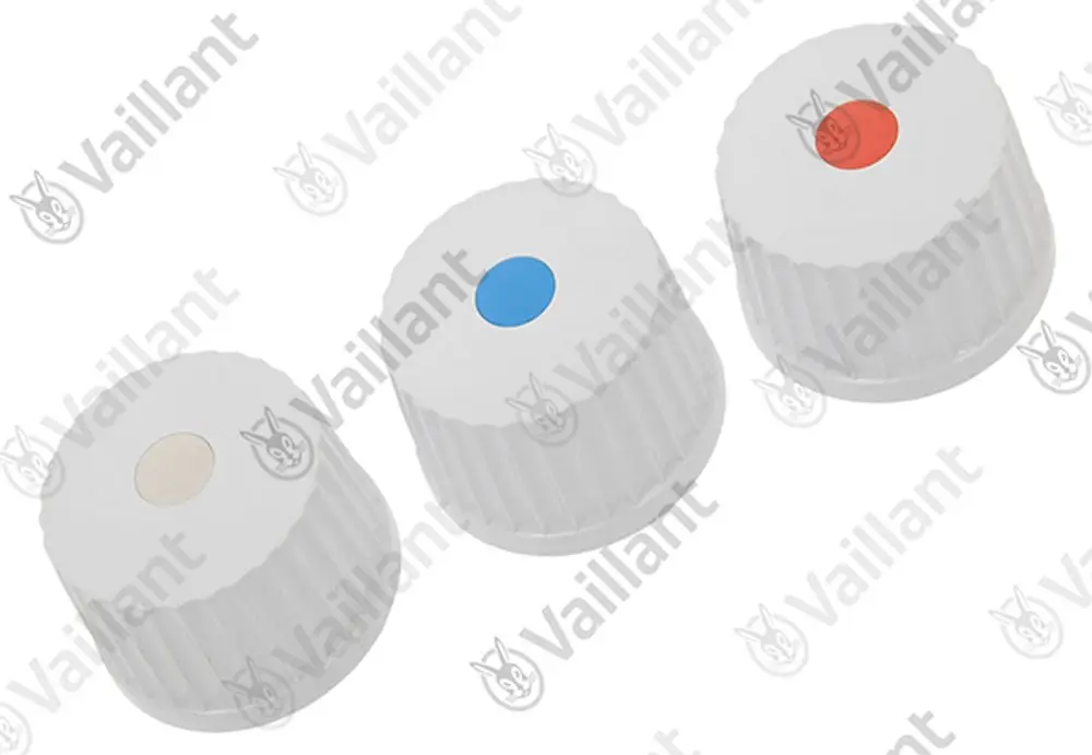 Set von drei weißen Drehknöpfen von Vaillant mit unterschiedlichen farbigen Markierungen auf der Oberseite (beige, blau, rot) und gerillter Oberfläche.